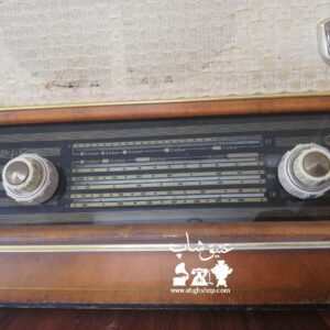 رادیو لامپی سونبرگ آلمان محصول سال ۱۹۵۹ میلادی فیبر پشت و پارچه فابریک ۴ موج بدنه چوب رنگ فابریک طول ۴۹ ارتفاع ۳۳ وزن ۶ کیلو کاملا بکر و دست نخورده
